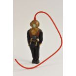 A rare Saxon Tower Toys, The Diver, plastic and celluloid, with red rubber tube, c.