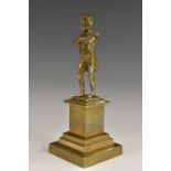 A 19th century desk bronze, of Napoleon Bonaparte, he stands in iconic pose, square plinth, 20.