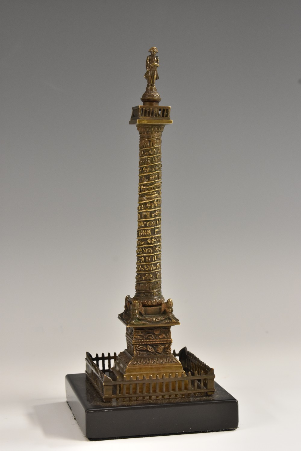 A 19th century French bronze Grand Tour model, of the Vendome Column, square belge noir base, 18.