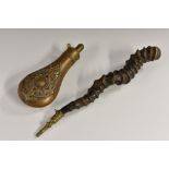 A 19th century copper and brass shot flask, embossed with strapwork, 20cm long; a horn powder flask,