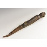 Tribal Art - a figural peg or implement, iron mounted terminal,