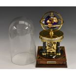 A Franklin Mint National Geographic Society Millenium clock, eight-day movement, glass dome,