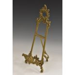 A 19th century Rococo Revival gilt brass table easel,