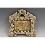 A 19th century mother-of-pearl and hardwood icon frame, from the Holy Land,