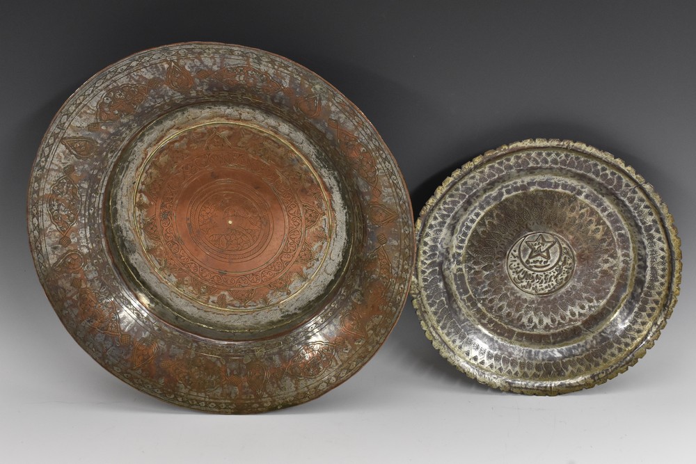 A 19th century Middle Eastern tinned copper circular dish,