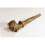 Tribal Art - a Maori hardwood contemplative evening pipe, the bowl as a grotesque man,