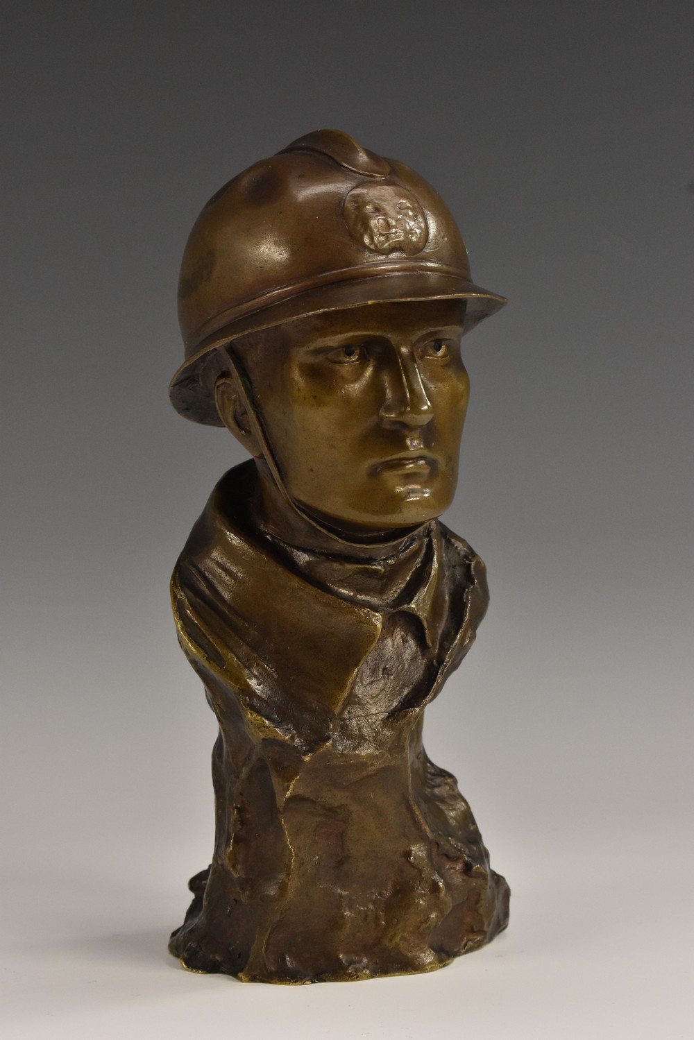 Henri-Joseph Holemans (Belgian 1894 - 1973), a brown patinated bronze, of a World War I soldier,