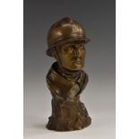 Henri-Joseph Holemans (Belgian 1894 - 1973), a brown patinated bronze, of a World War I soldier,