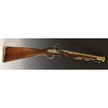 An 18th century Irish flintlock blunderbuss, by Trulock of Dublin, 37.