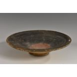 Antiquities - a Roman terracotta flared shallow dish, painted in earth tones and centred by a blush,