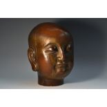 A Chinese lacquer sculptural fragment, the head of Lohan, 22cm high,