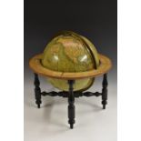 A 19th century Scottish terrestrial table top library globe, Johnston's Twelve Inch Globe,