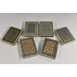 A collection of Anglo-Indian sadeli marquetry and sandalwood rectangular visiting card cases,