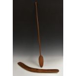 Tribal Art - an Australian Aboriginal boomerang, 63cm long; a club or paddle, leaf-shaped blade,