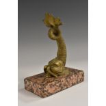 A 19th century gilt desk bronze, of a dolphin, rectangular granite base,