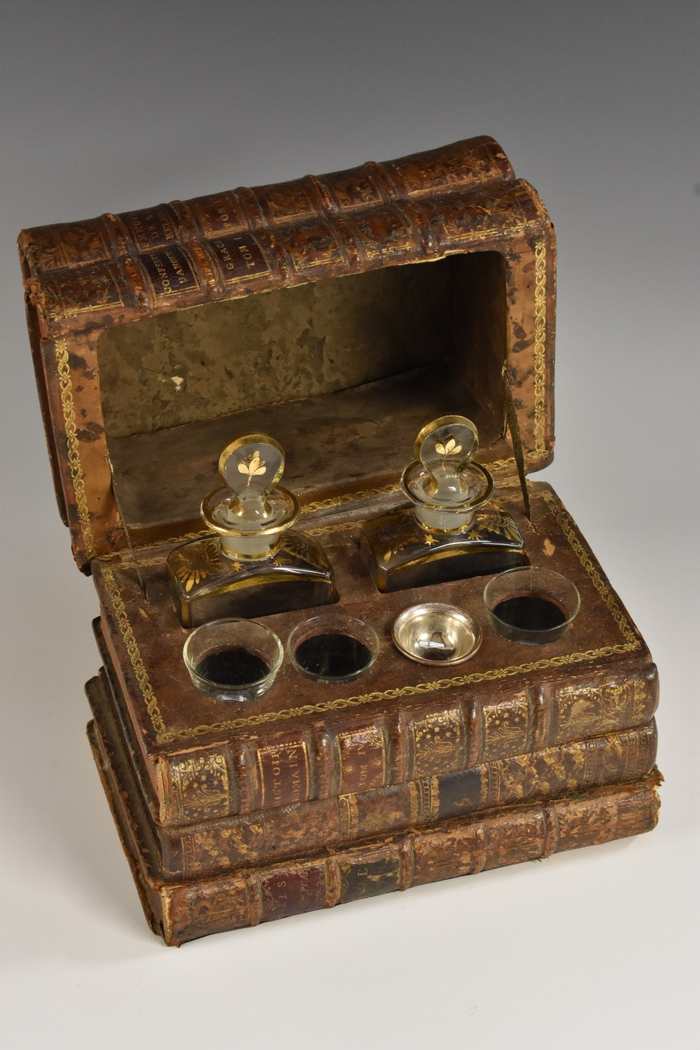 A 19th century bibliophillic tromp l'oeil decanter box,