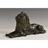 French School (19th century), a dark patinated library sculpture, of a recumbent lion,