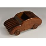 An early 20th century mahogany novelty cigarette and vesta box, as a motor car,