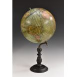 A 12" terrestrial globe, for Columbus Erdglobus by Paul Oestergaard, Berlin, turned ebonised base,