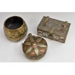 A Middle-Eastern silver and copper damascened brass rectangular casket,