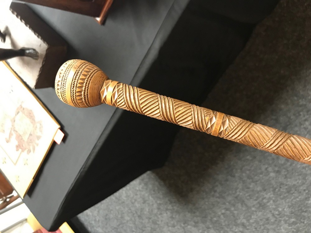 A 19th century Colonial hardwood gentleman's walking cane, chip carved with geometric motifs, - Image 3 of 5