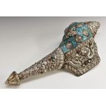 A Tibetan silver mounted conch shell summons, inlaid with turquoise and collect set with cabachons,
