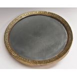 A 19th century Iranian circular brass looking-glass,