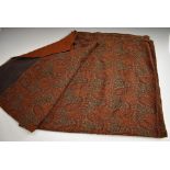 Textiles - a 19th century paisley shawl, typically worked in autumnal tones,