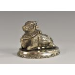 An Indian silvered desk weight, cast as Nandi,