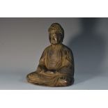 Chinese School, a dark patinated bronze, Buddha, seated in meditation,