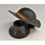 An early 20th century art metal novelty inkwell, as a hat, hinged cover, weighted base, 10.