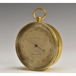 A 19th century gilt brass travelling aneroid barometer, 7cm silvered register inscribed Adie,