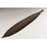 Tribal Art - an Australian Aboriginal woomera spear thrower, incise-carved with geometric motifs,