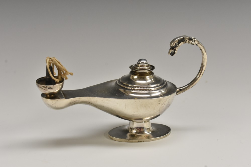 An Egyptian silver lamp shaped cigar lighter, 13.