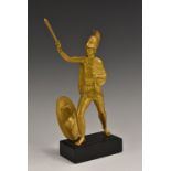 A 19th century gilt bronze desk model, of a Classical soldier, he stands, with sword raised,