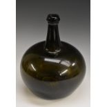 A large late 18th/early 19th century Dutch free blown onion wine bottle, 27cm high, c.