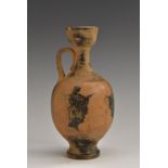 A Greek lekythos, painted in the black-figure style with a procession of muses, 14.