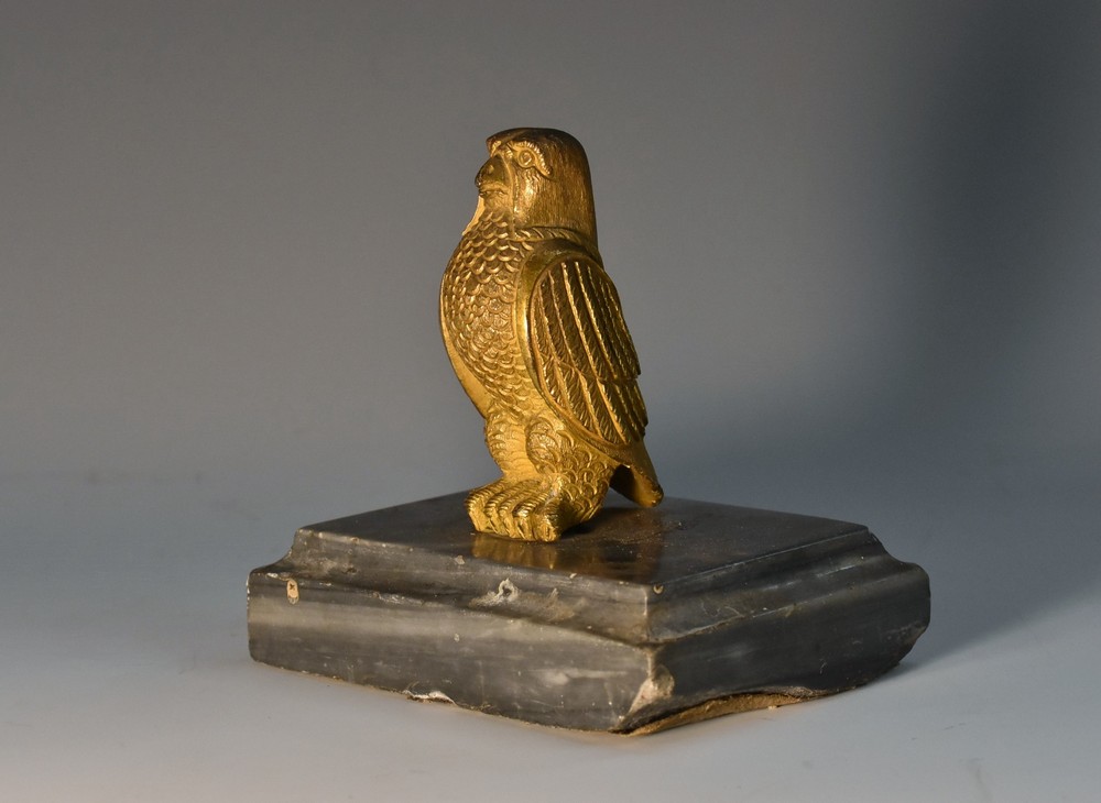 A 19th century gilt bronze mounted desk weight, as a hawk, rectangular marble base,