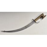 A Moroccan nimcha dagger, 39.