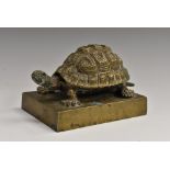 A 19th century bronze novelty inkwell, as a tortoise, hinged cover, rectangular base, 14cm wide, c.