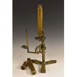 A William IV brass monocular compound microscope, by Andrew Pritchard, London, convex mirror,
