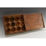 Treen - an interesting set of twelve specimen wood napkin rings,