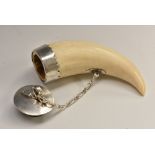 A 19th century Scottish silver coloured metal whale tooth snuff mull,