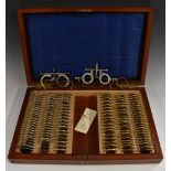 Medical Interest - Optometry - an early 20th century optician's trial lens set,