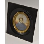 Continental School (19th century), a portrait miniature, of a young girl wearing a blue dress,