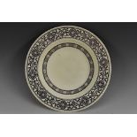 An interesting 19th century Gothic Revival leadless glaze earthenware soup plate, by Coalpoart,