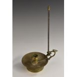 A French Empire brass bouillotte chamberstick, of typical form,