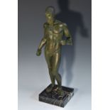 A museum type verdigris composition model, of a soldier, after the Ancient Greek,