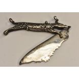 An unusual 19th century white coloured metal fruit knife in the form of a stylized hound, 8.