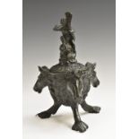 A 19th century Renaissance Revival patinated bronze tripod inkwell,
